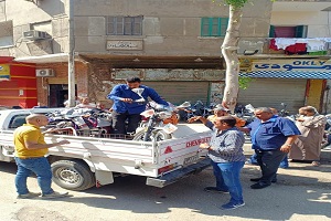حملة لرفع الإشغالات بالحي
