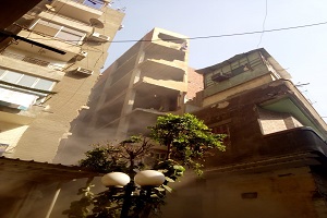 محافظ القاهرة إزالة خمسة طوابق مخالفة لرخصة عقار بحي عابدين2.jpg
