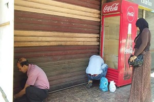 تنظيم مواعيد فتح وغلق المحلات والمطاعم العامة والكافيهات