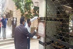 غلق محل كاوتش مخالف بشارع الحجاز