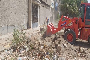 أعمال نظافة ببعض الشوارع  بالحي