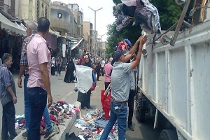 حملة لرفع الإشغالات من شوارع الحي