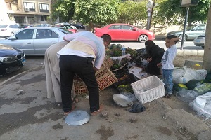 رفع اشغالات الباعة الجائلين بشارع احمد امين بسانت فاتيما