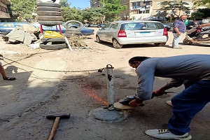 إزالة حديد وسلاسل من شارع حمودة محمود 