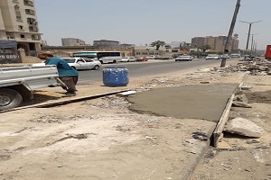 تطوير ورصف شوارع الحى