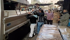 حملة لرفع الإشغالات ببعض الشوارع بالحي