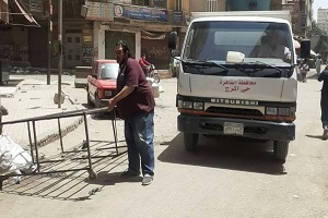 حملة لرفع الاشغالات بشارع عين شمس وميدان الصحة 