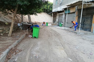 أعمال نظافة ببعض المناطق بالحي