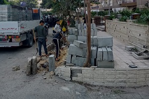 اعمال تطوير ورفع كفاءة الارصفة بشارع حسن صادق