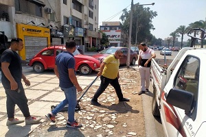 حملة لرفع الاشغالات من بعض المناطق بالحي