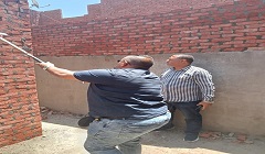 متابعة ازالة المباني المخالفة بنطاق الحي 