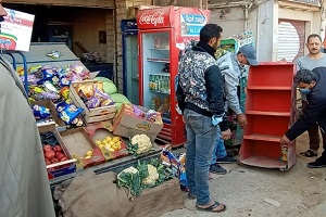 حملة لرفع إشغالات المحلات بشارع الجامعة 