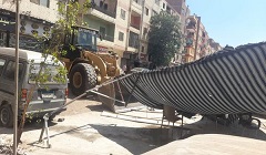 حملة لإزالة باكيات حديدية وجراج مخالف