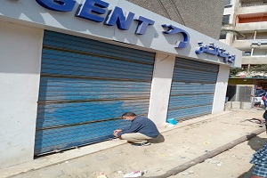 غلق وتشميع محلات بدون ترخيص بشارع افريقيا 
