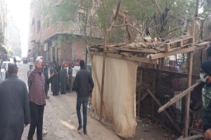 حملة لرفع اشغالات تحويطة خشبية بناصية شارع عمر بن عبد العزيز