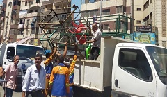 حملة لرفع الاشغالات ببعض الشوارع بالحي
