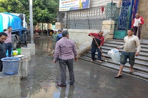 أعمال نظافة بالدرب الأحمر