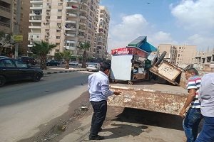 اعمال نظافة و ازالة اشغالات و مخالفات بالحي