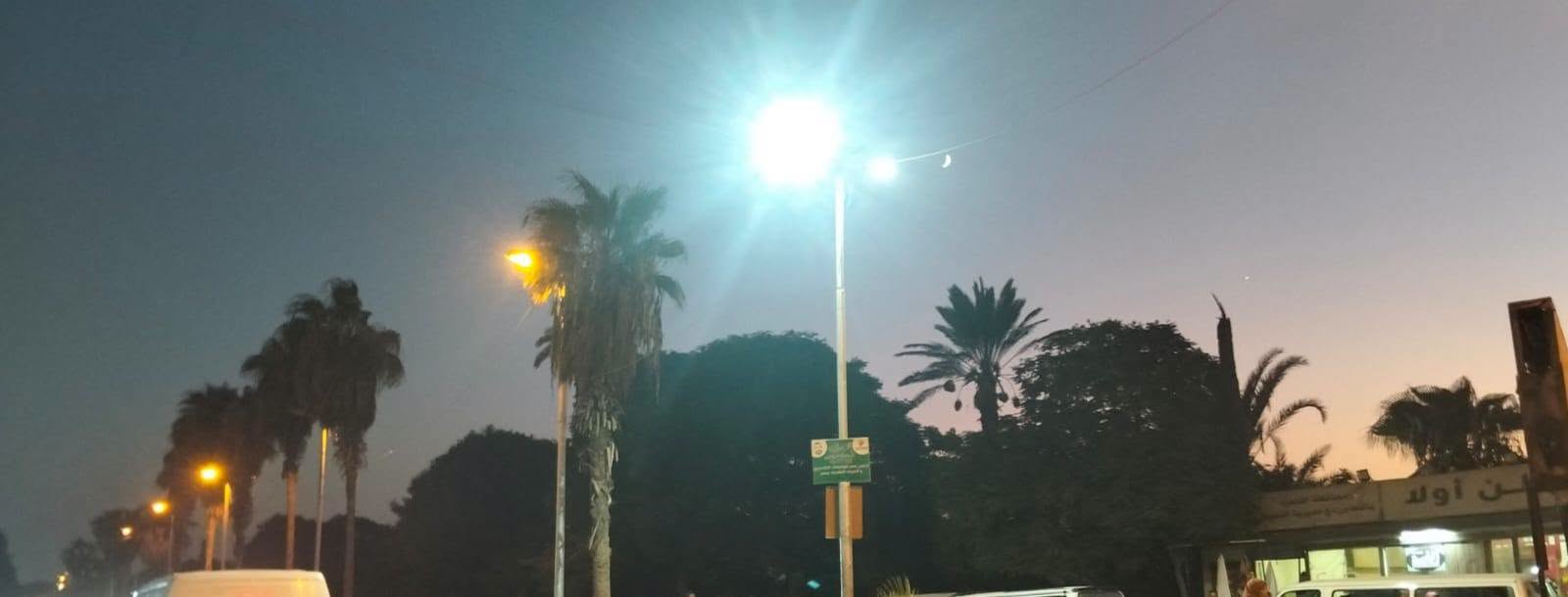صيانة ورفع كفاءة أعمدة الإنارة ودهانها بميدان تبين البلد