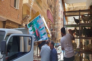 حملة لرفع الإشغالات ببعض الشوارع بالحي