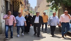 متابعة تنفيذ خطة الرصف وتطوير شوارع الحى