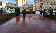 متابعة اعمال غسيل ونظافة حديقة ميدان المطرية