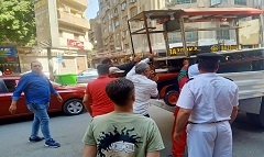 حملات مكثفة لرفع الإشغالات بشارع المنيل