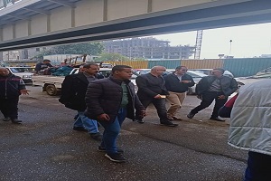 حملة لرفع الإشغالات من شوارع الحي