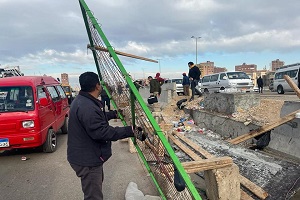 رفع وإزالة جميع إشغالات الباعة الجائلين بأعلى الطريق الدائري