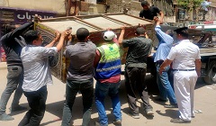 رفع الاشغالات والباعة الجائلين بشارع عزيز المصري
