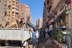حملة لرفع الإشغالات بشارع الترولي