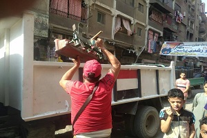 رفع الاشغالات من  شارع المحطة الغربى وشارع سيد حمادة
