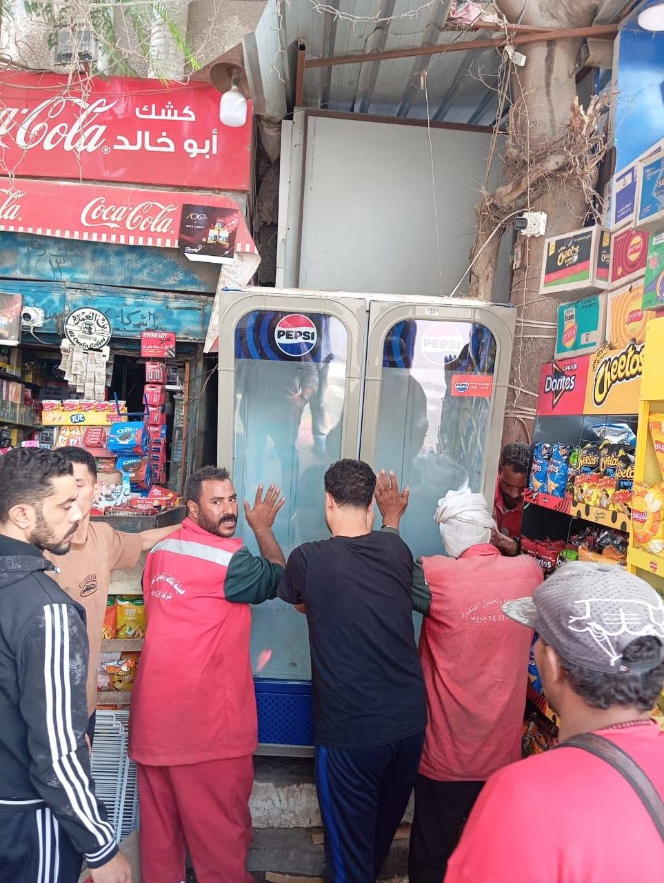 رفع إشغالات الأكشاك بمنطقة مساكن الزلزال وإيداعها مخازن الحي