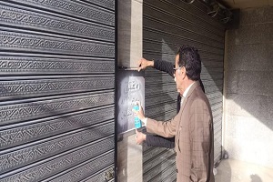 حملة مكبرة لغلق وتشميع عدد 4 محلات مخالفة بالحي