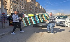 حملة لرفع الاشغالات بطريق الاوتوستراد في نطاق الحي