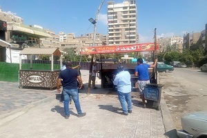 حملة لرفع الاشغالات بشارع شمس الدين الزهبى