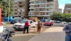 حملة لرفع الاشغالات ببعض الشوارع بالحي
