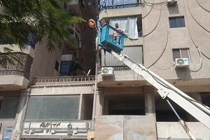 صيانة أعمدة الانارة بشارع الزهراء بحي عين شمس