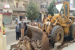 بدء اعمال التطوير والتجريد والرصف بشارع الترولى من ميدان المسلة