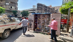 حملة لرفع الإشغالات من شوارع الحي