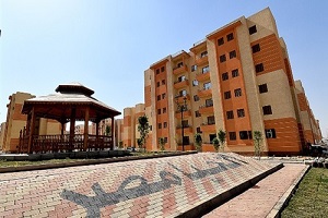 تسليم 42 وحدة بمدينة 6 أكتوبر لسكان سور "مجرى العيون"