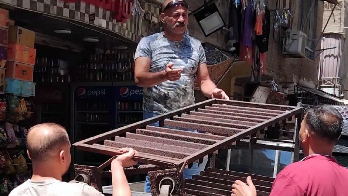 استمرار جهود الحي في رفع الإشغالات وإعادة الانضباط للشارع 