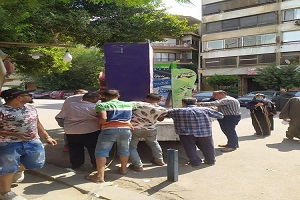 حمله لرفع الإشغالات بنطاق الحي 