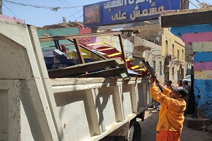 رفع الإشغالات من شوارع الحي