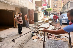 إزالة لأعمال مخالفة في المهد بعقار  بشارع محمود عصمت