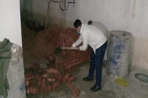 إزالة بناء مخالف بجراج عقار بحي شرق مدينة نصر