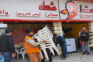 حملة لرفع اشغالات المحلات بشارع عين شمس