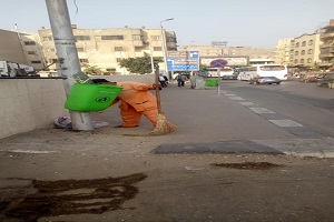 أعمال نظافة بشارع المنصورية ومتفرعاته
