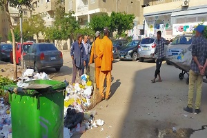 رفع مخلفات القمامة بشارع السويس مع شارع موسى بن نصير