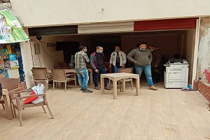 رفع اشغالات مكتب تصوير مستندات بعقار بشارع المهندسين العسكريين